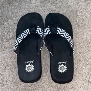 Yellow box flip flops